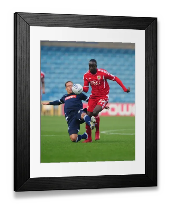 Framed Print : Adomah Evasive: Millwall vs. Bristol City, Championship 2011 - Albert Adomah Dodges Brian Howard's Challenge (Editorial Use Only) Framed Print : Adomah Evasive: Millwall vs. Bristol City, Championship 2011 - Albert Adomah Dodges Brian Howard's Challenge (Editorial Use Only)