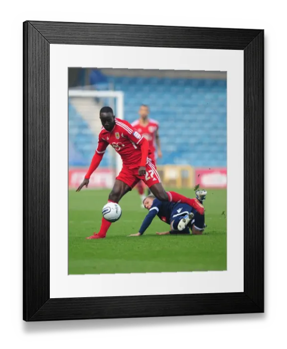 Framed Print : Albert Adomah's Evasive Move Against Brian Howard: Millwall vs. Bristol City Championship Clash - 20 / 11 / 2011 Framed Print : Albert Adomah's Evasive Move Against Brian Howard: Millwall vs. Bristol City Championship Clash - 20 / 11 / 2011
