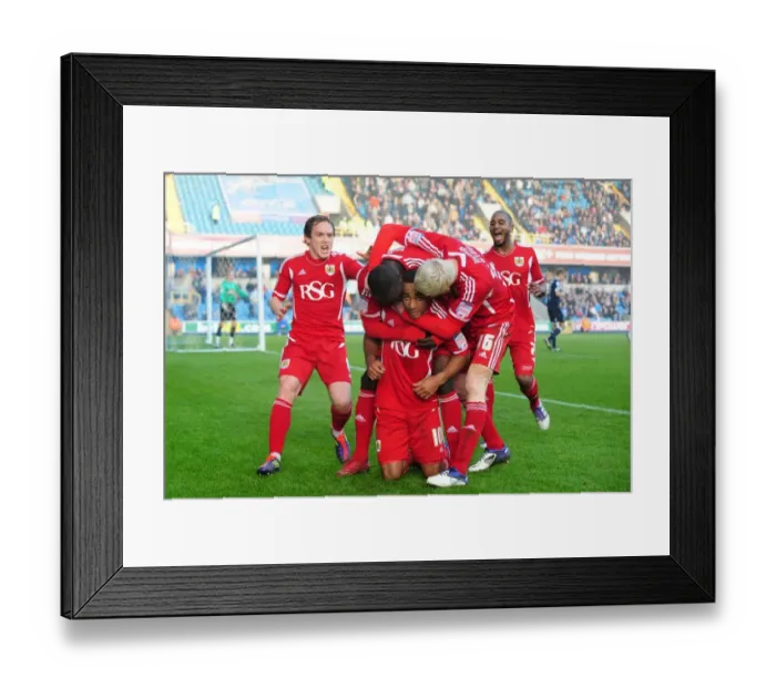 Framed Print : Bristol City's Nicky Maynard Scores Brace in Millwall vs. Bristol City Championship Match, 2011 Framed Print : Bristol City's Nicky Maynard Scores Brace in Millwall vs. Bristol City Championship Match, 2011