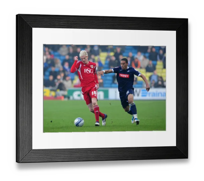 Framed Print : Championship Showdown: McGivern vs. Feeney - Bristol City's Ryan McGivern Battles for the Ball against Liam Feeney of Millwall, 2011