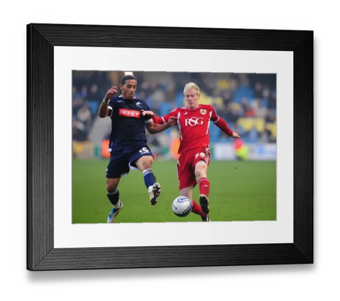 Framed Print : Battling for Supremacy: McGivern vs. Feeney in Millwall vs. Bristol City Championship Clash (November 2011)