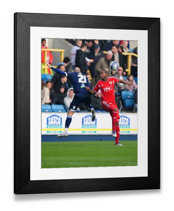 Framed Print : Battling for Supremacy: Marvin Elliott vs. Jack Smith in Millwall vs. Bristol City Championship Clash, 2011 Framed Print : Battling for Supremacy: Marvin Elliott vs. Jack Smith in Millwall vs. Bristol City Championship Clash, 2011