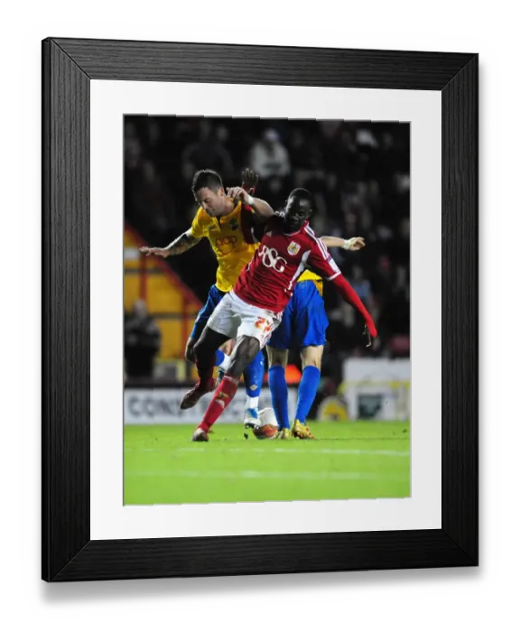 Framed Print : Bristol City's Albert Adomah vs. Danny Fox in Championship Clash at Ashton Gate Stadium (November 26, 2011) Framed Print : Bristol City's Albert Adomah vs. Danny Fox in Championship Clash at Ashton Gate Stadium (November 26, 2011)