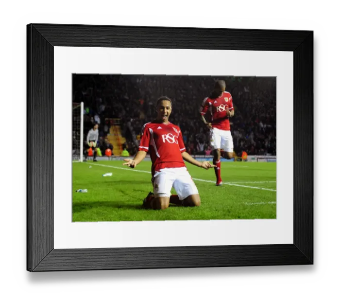 Framed Print : Nicky Maynard's Double: The Ecstatic Moment of Bristol City's Victory Against Southampton