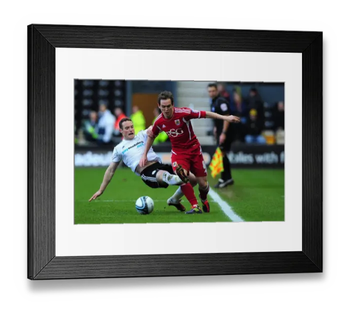 Framed Print : Derby County vs. Bristol City: Neil Kilkenny Fouled by Ben Davies - Championship Match, 10th December 2011 Framed Print : Derby County vs. Bristol City: Neil Kilkenny Fouled by Ben Davies - Championship Match, 10th December 2011