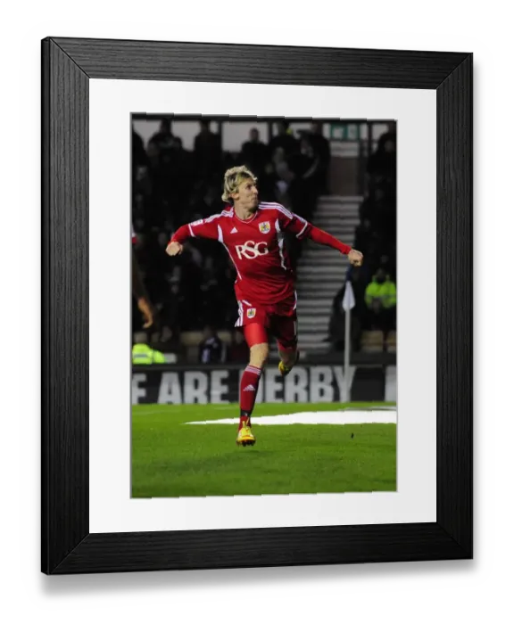 Framed Print : Bristol City's Martyn Woolford Celebrates Goal Against Derby County in Championship Match, December 10, 2011 (Editorial Use Only)
