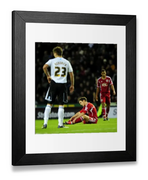 Framed Print : Neil Kilkenny's Disappointment: Derby County Overpowers Bristol City in Championship Clash Framed Print : Neil Kilkenny's Disappointment: Derby County Overpowers Bristol City in Championship Clash