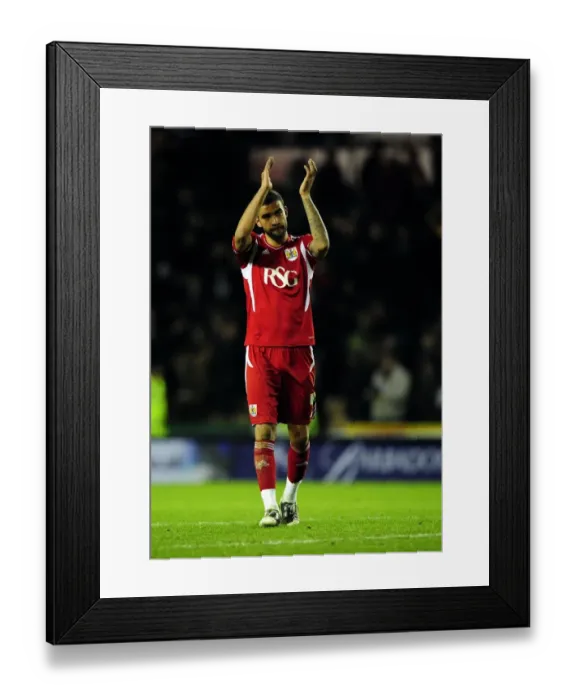 Framed Print : Bristol City's Liam Fontaine Shows Appreciation to Traveling Fans at Derby County Championship Match - 10 / 12 / 2011