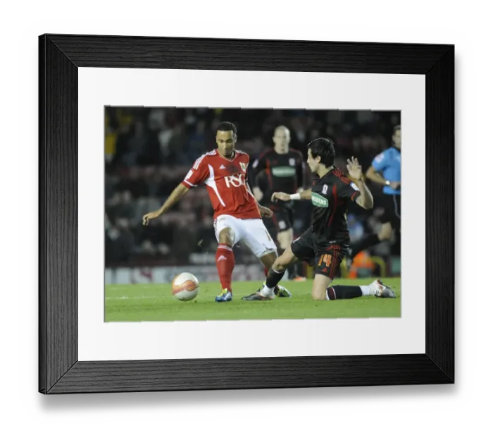 Framed Print : Bristol City's Nicky Maynard Clashes with Rhys Williams of Middlesbrough - December 3, 2011