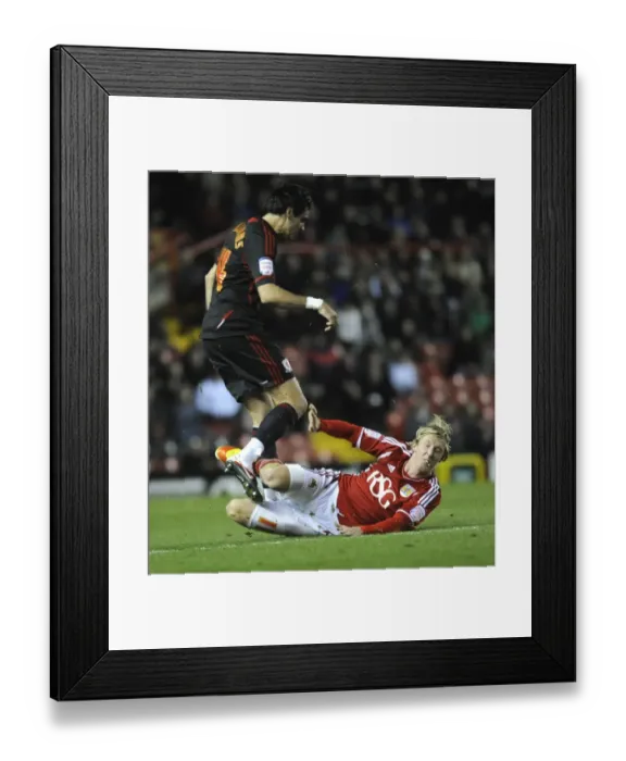 Framed Print : Bristol City vs Middlesbrough: Martyn Woolford Clashes with Rhys Williams