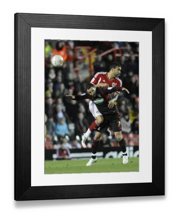 Framed Print : Bristol City vs. Middlesbrough: Liam Fontaine vs. Scott McDonald in Aerial Battle - Neil Phillips / Pinnacle, 03 / 12 / 2011 Framed Print : Bristol City vs. Middlesbrough: Liam Fontaine vs. Scott McDonald in Aerial Battle - Neil Phillips / Pinnacle, 03 / 12 / 2011