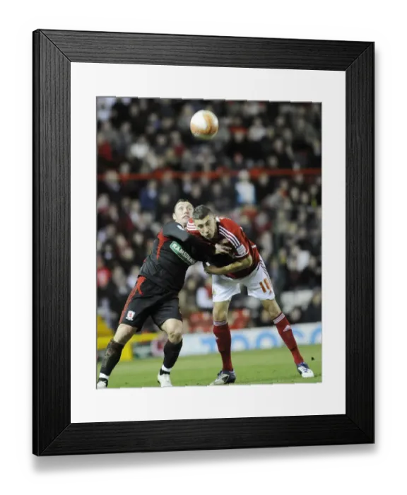 Framed Print : Bristol City vs. Middlesbrough: Aerial Clash Between James Wilson and Scott McDonald Framed Print : Bristol City vs. Middlesbrough: Aerial Clash Between James Wilson and Scott McDonald