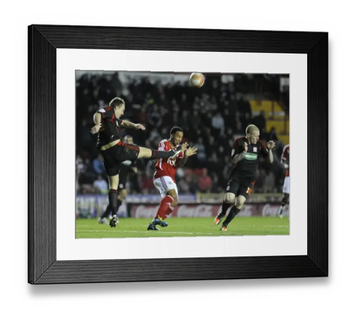 Framed Print : Bristol City's Nicky Maynard Evades Middlesbrough Challenge: Football Rivalry at Ashton Gate, December 2011