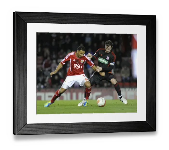 Framed Print : Bristol City's Nicky Maynard Snatches Ball from Middlesbrough's Matthew Bates - Bristol City v Middlesbrough, 03 / 12 / 2011