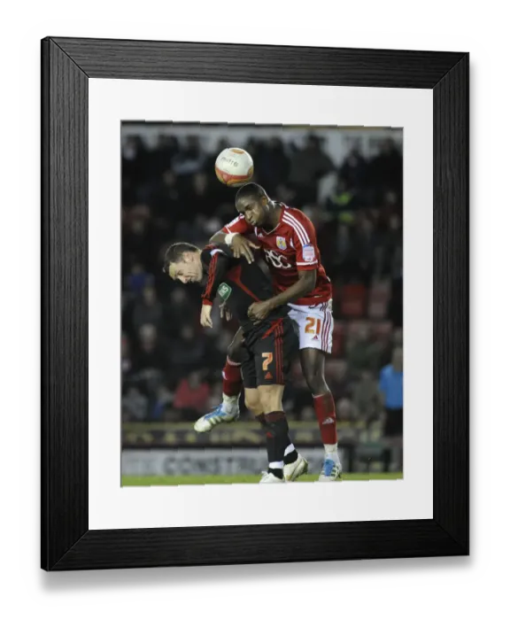 Framed Print : Bristol City vs Middlesbrough: Kalifa Cisse Challenges Scott McDonald - Neil Phillips / Pinnacle, 03 / 12 / 2011