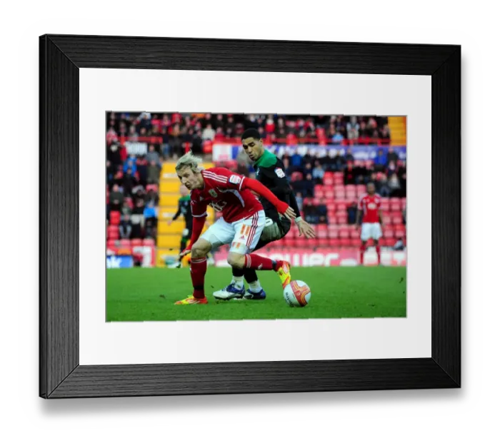 Framed Print : Battling for Championship Supremacy: Woolford vs. McGugan (17 / 12 / 2011) - Martyn Woolford of Bristol City and Lewis McGugan of Nottingham Forest Clash in Championship Match Framed Print : Battling for Championship Supremacy: Woolford vs. McGugan (17 / 12 / 2011) - Martyn Woolford of Bristol City and Lewis McGugan of Nottingham Forest Clash in Championship Match
