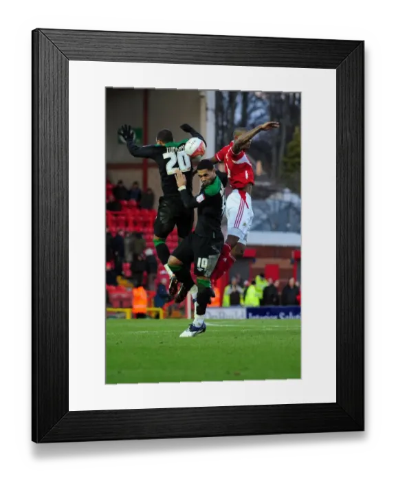Framed Print : Intense Championship Clash: Marvin Elliott vs. McGugan and Tudgay (Bristol City vs. Nottingham Forest, 17 / 12 / 2011)