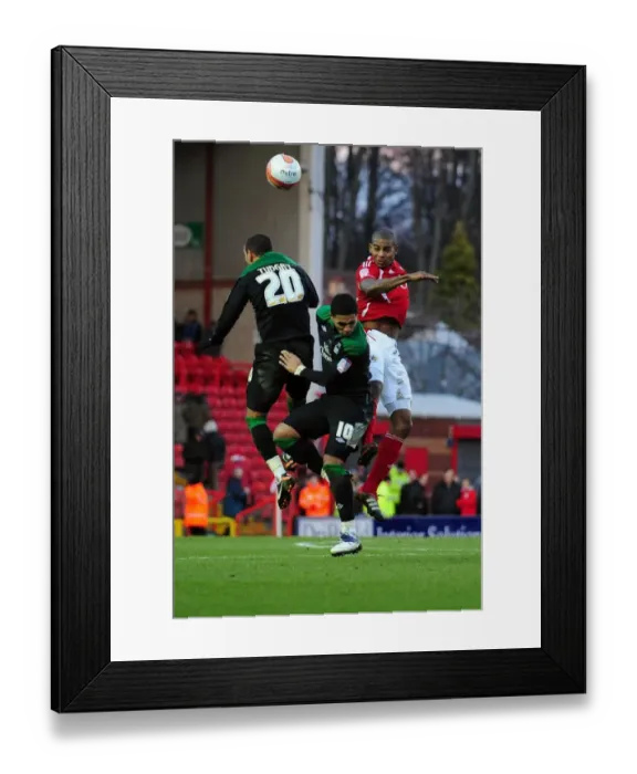 Framed Print : Battling for Championship Glory: Marvin Elliott vs. Lewis McGugan and Marcus Tudgay - Championship Showdown at Ashton Gate, 17 / 12 / 2011 (Bristol City vs. Nottingham Forest) Framed Print : Battling for Championship Glory: Marvin Elliott vs. Lewis McGugan and Marcus Tudgay - Championship Showdown at Ashton Gate, 17 / 12 / 2011 (Bristol City vs. Nottingham Forest)
