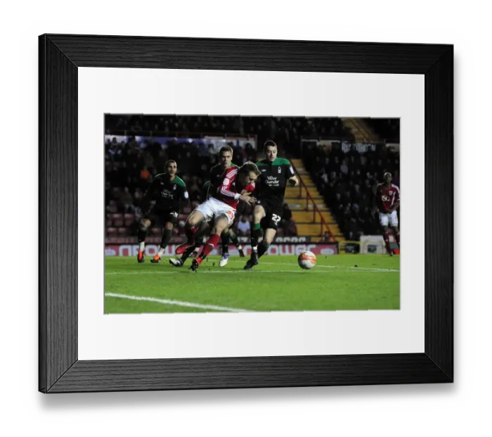 Framed Print : Brett Pitman of Bristol City Holds Ball in Championship Match vs. Nottingham Forest (December 17, 2011)