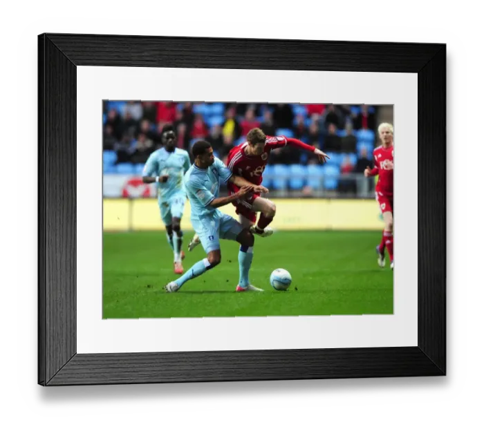 Framed Print : Stephen Pearson vs. Cyrus Christie: Battle for the Ball in Coventry City vs. Bristol City Championship Clash (December 2011) Framed Print : Stephen Pearson vs. Cyrus Christie: Battle for the Ball in Coventry City vs. Bristol City Championship Clash (December 2011)