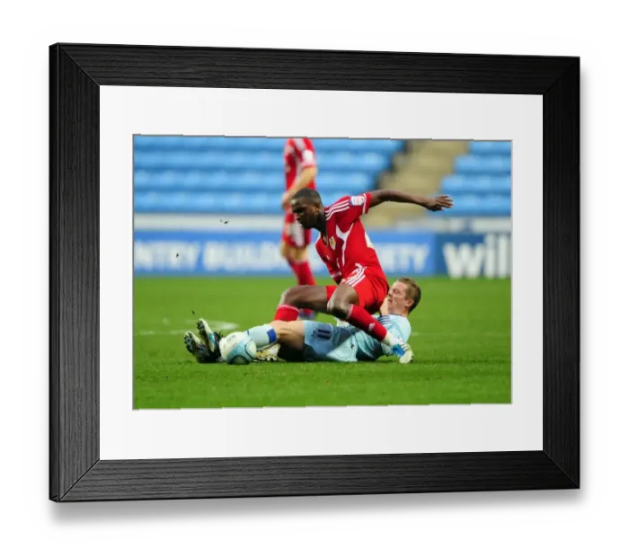 Framed Print : Coventry's McSheffrey Fouls Bristol City's Cisse in Championship Clash - 26 / 12 / 2011