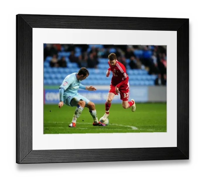 Framed Print : Stephen Pearson vs. Richard Keogh: Intense Battle in Coventry City vs. Bristol City Championship Match, December 2011 Framed Print : Stephen Pearson vs. Richard Keogh: Intense Battle in Coventry City vs. Bristol City Championship Match, December 2011