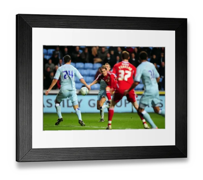 Framed Print : Neil Kilkenny's Shot Blocked in Coventry City vs. Bristol City Championship Match, December 2011