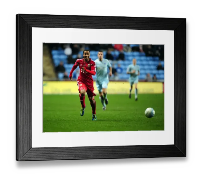 Framed Print : Nicky Maynard Chases Loose Ball in Coventry City vs. Bristol City Championship Match, 26 / 12 / 2011