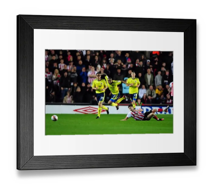 Framed Print : Southampton vs. Bristol City: Marvin Elliott Fouled by Adam Lallana - Championship Football Match, 30 / 12 / 2011 Framed Print : Southampton vs. Bristol City: Marvin Elliott Fouled by Adam Lallana - Championship Football Match, 30 / 12 / 2011