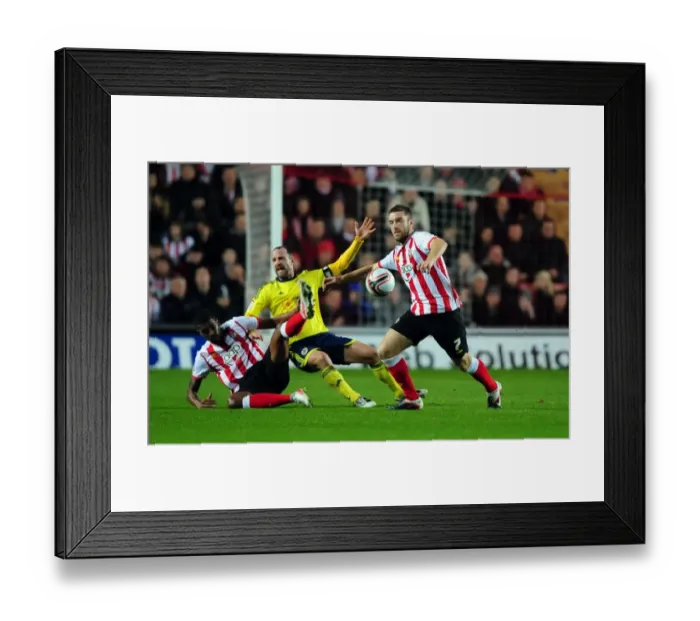 Framed Print : Bristol City's Louis Carey Fouled by Southampton's Guilherme do Prado during Championship Match Framed Print : Bristol City's Louis Carey Fouled by Southampton's Guilherme do Prado during Championship Match