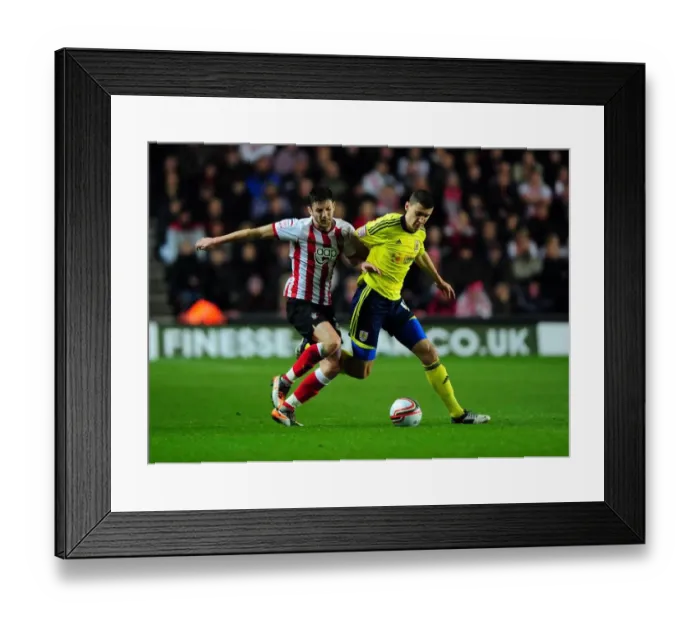 Framed Print : Adam Lallana vs. James Wilson: Battle for the Ball in Southampton vs. Bristol City Championship Clash (December 2011) Framed Print : Adam Lallana vs. James Wilson: Battle for the Ball in Southampton vs. Bristol City Championship Clash (December 2011)