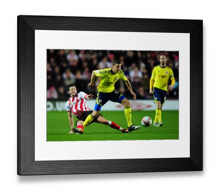 Framed Print : Southampton's Adam Lallana vs. Bristol City's James Wilson: Battle for the Ball in Championship Match, December 2011 Framed Print : Southampton's Adam Lallana vs. Bristol City's James Wilson: Battle for the Ball in Championship Match, December 2011