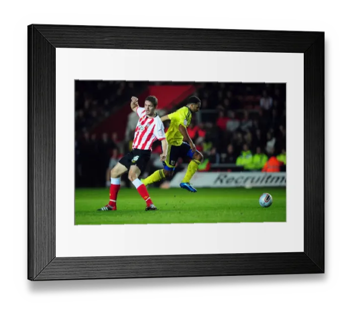 Framed Print : Championship Showdown: Nicky Maynard Outwits Jos Hooiveld - Southampton vs. Bristol City (30 / 12 / 2011) Framed Print : Championship Showdown: Nicky Maynard Outwits Jos Hooiveld - Southampton vs. Bristol City (30 / 12 / 2011)