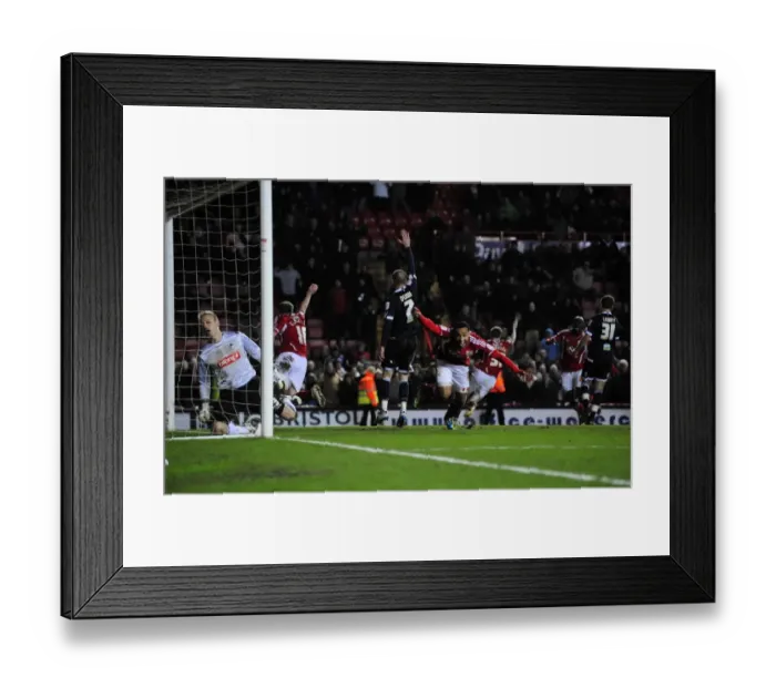 Framed Print : Last-Minute Drama: Nicky Maynard's Game-Winning Goal for Bristol City against Millwall in the Championship (03 / 01 / 2012) Framed Print : Last-Minute Drama: Nicky Maynard's Game-Winning Goal for Bristol City against Millwall in the Championship (03 / 01 / 2012)