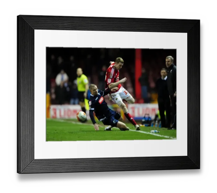 Framed Print : Bristol City's Stephen Pearson Dodges Alan Dunne's Tackle in Championship Clash between Bristol City and Millwall - 03 / 01 / 2012 Framed Print : Bristol City's Stephen Pearson Dodges Alan Dunne's Tackle in Championship Clash between Bristol City and Millwall - 03 / 01 / 2012