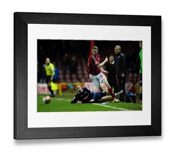 Framed Print : Bristol City's Stephen Pearson Dodges Alan Dunne's Tackle in Intense Championship Clash (03 / 01 / 2012) Framed Print : Bristol City's Stephen Pearson Dodges Alan Dunne's Tackle in Intense Championship Clash (03 / 01 / 2012)