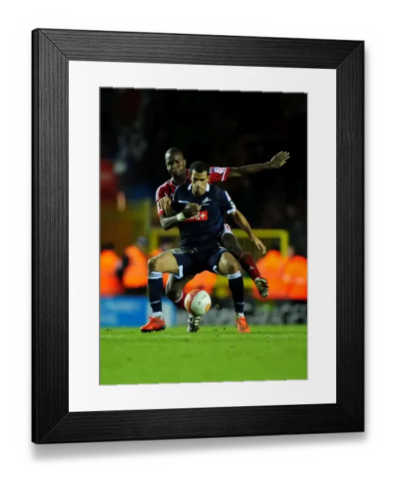 Framed Print : Bristol City vs Millwall: Kalifa Cisse vs Hameur Bouazza Battle for the Ball - Championship Match, January 2012 Framed Print : Bristol City vs Millwall: Kalifa Cisse vs Hameur Bouazza Battle for the Ball - Championship Match, January 2012