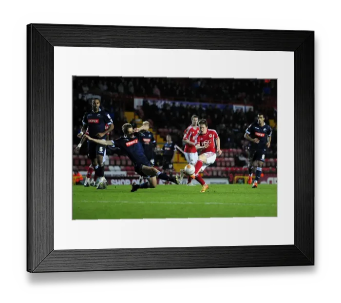 Framed Print : Bristol City's Neil Kilkenny Shoots in Championship Match against Millwall (03 / 01 / 2012) Framed Print : Bristol City's Neil Kilkenny Shoots in Championship Match against Millwall (03 / 01 / 2012)
