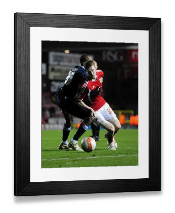 Framed Print : Bristol City vs Millwall: Stephen Pearson Turns Away Jimmy Abdou - Championship Match, 03 / 01 / 2012