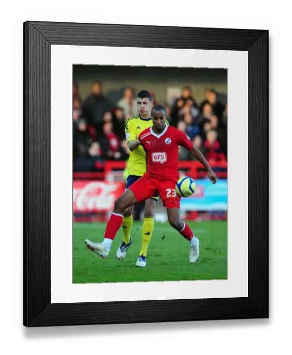 Framed Print : Bristol City's James Wilson vs. Tyrone Barnett in FA Cup Clash: Crawley Town v Bristol City (07 / 01 / 2012) Framed Print : Bristol City's James Wilson vs. Tyrone Barnett in FA Cup Clash: Crawley Town v Bristol City (07 / 01 / 2012)