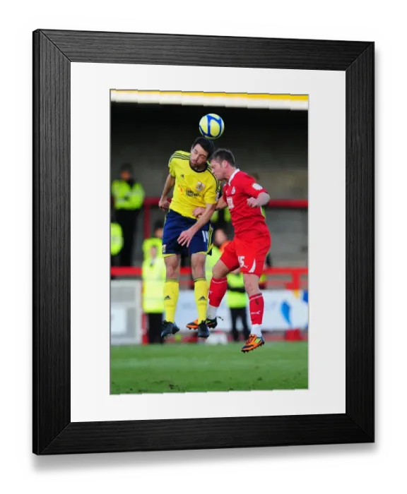 Framed Print : Bristol City's Cole Skuse vs. Dannie Bulman in FA Cup Clash: Crawley Town vs. Bristol City (07 / 01 / 2012)