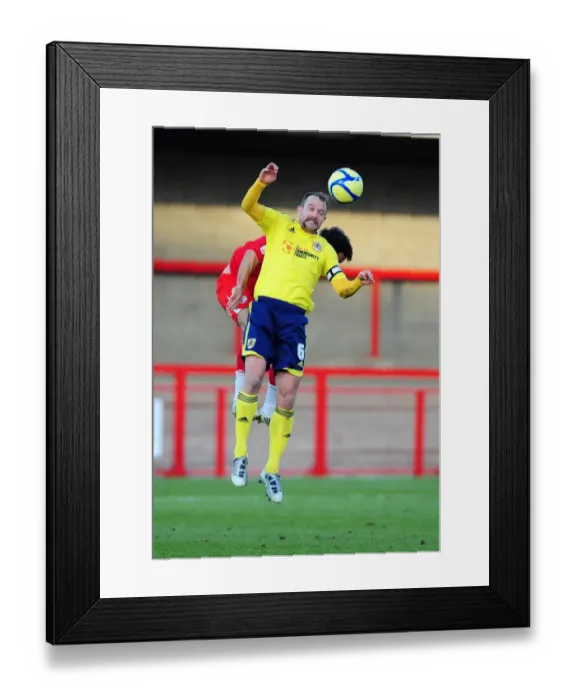 Framed Print : Bristol City's Louis Carey vs. Matt Tubbs in FA Cup Clash at Crawley Town - 07 / 01 / 2012 Framed Print : Bristol City's Louis Carey vs. Matt Tubbs in FA Cup Clash at Crawley Town - 07 / 01 / 2012