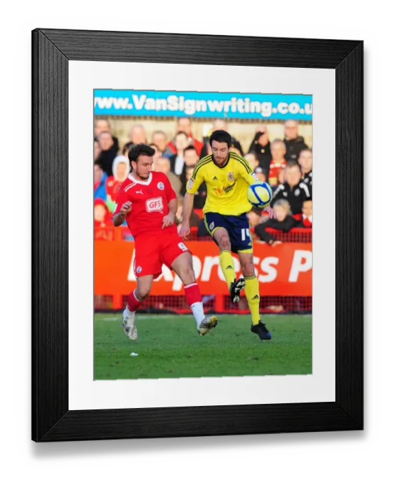 Framed Print : Battling for Supremacy: Cole Skuse vs. Matt Tubbs in FA Cup Clash between Crawley Town and Bristol City (07 / 01 / 2012)