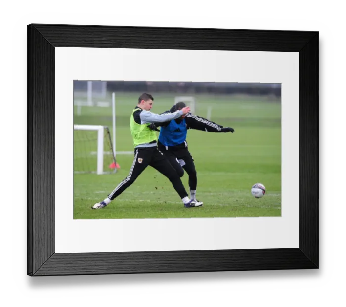 Framed Print : Bristol City FC: Kalifa Cisse and James Wilson Battle for the Ball during Training Session Framed Print : Bristol City FC: Kalifa Cisse and James Wilson Battle for the Ball during Training Session