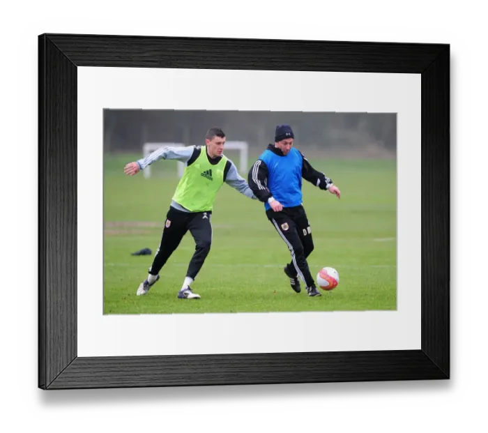 Framed Print : McInnes vs. Wilson: A Training Showdown at Memorial Stadium - Derek McInnes and James Wilson Lock Horns during Bristol City FC Training Framed Print : McInnes vs. Wilson: A Training Showdown at Memorial Stadium - Derek McInnes and James Wilson Lock Horns during Bristol City FC Training