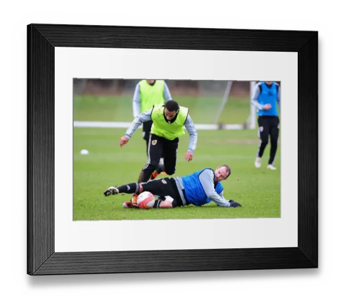Framed Print : Bristol City: Nicky Maynard and Louis Carey in Intense Training Battle Framed Print : Bristol City: Nicky Maynard and Louis Carey in Intense Training Battle