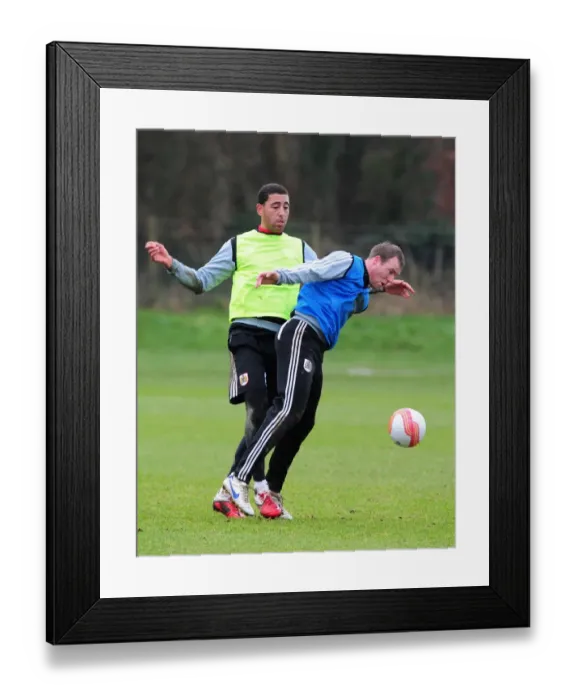 Framed Print : Intense Training Clash: David Clarkson vs. Lewin Nyatanga, Bristol City Football Club Framed Print : Intense Training Clash: David Clarkson vs. Lewin Nyatanga, Bristol City Football Club