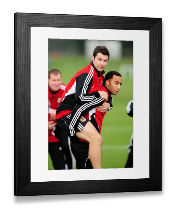 Framed Print : Bristol City: Maynard and Foster in Deep Focus during Training Session Framed Print : Bristol City: Maynard and Foster in Deep Focus during Training Session