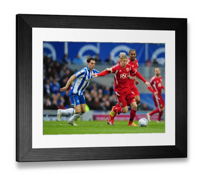 Framed Print : Battling for Supremacy: Martyn Woolford vs. Matthew Sparrow in the Championship Clash between Brighton and Bristol City - 14 / 01 / 2012 Framed Print : Battling for Supremacy: Martyn Woolford vs. Matthew Sparrow in the Championship Clash between Brighton and Bristol City - 14 / 01 / 2012