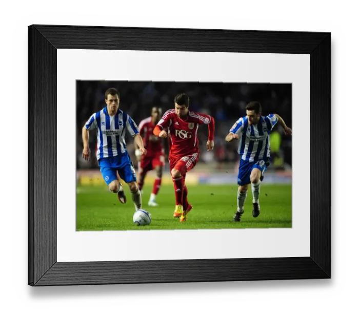 Framed Print : Brighton vs. Bristol City: Richard Foster Beats the Defence in Championship Clash - 14 / 01 / 2012